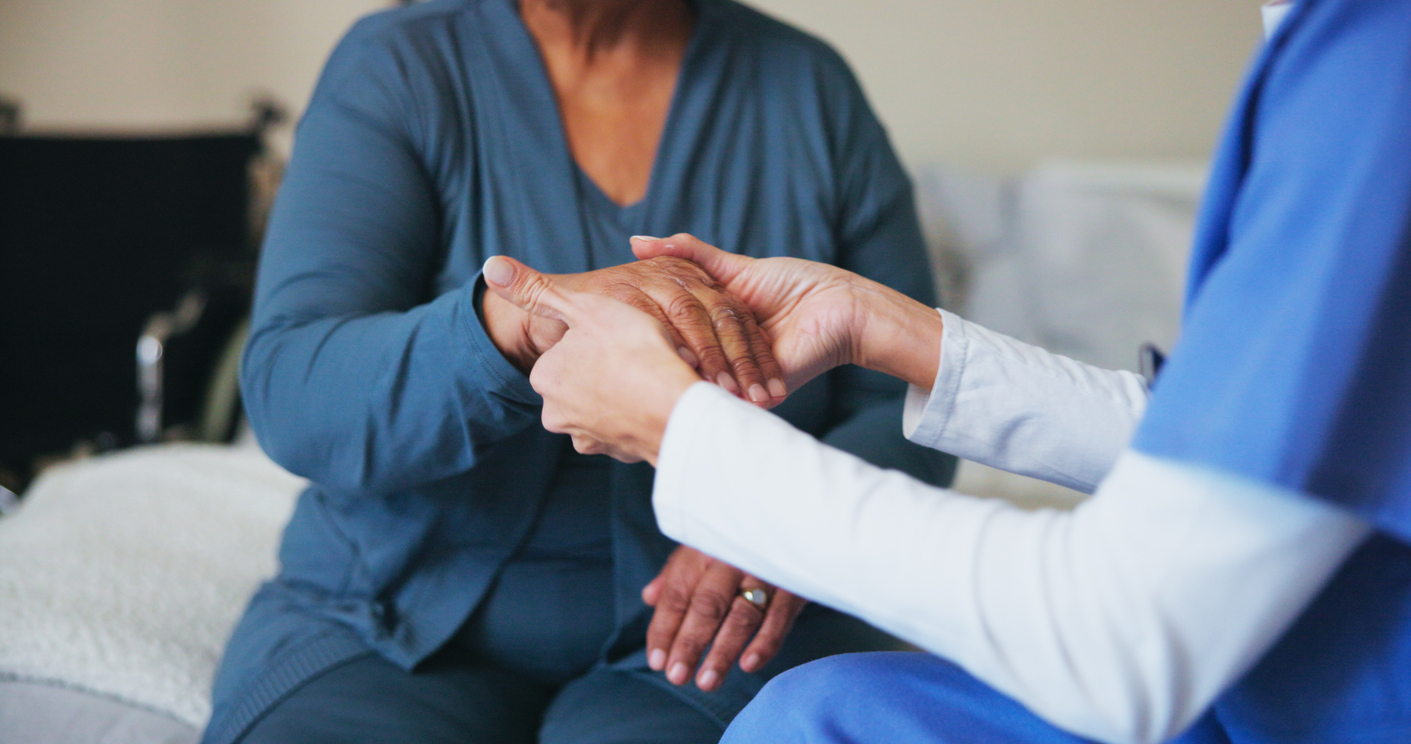 Arthritis, hands or healthcare with nurse and patient in bedroom of home for massage or preparation. Carpal tunnel, examine and medical with medicine professional in apartment for pain relief